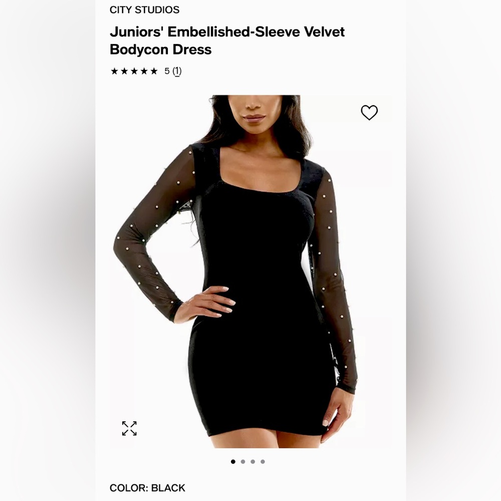Velvet black mini dress with sheer pearl sleeves.